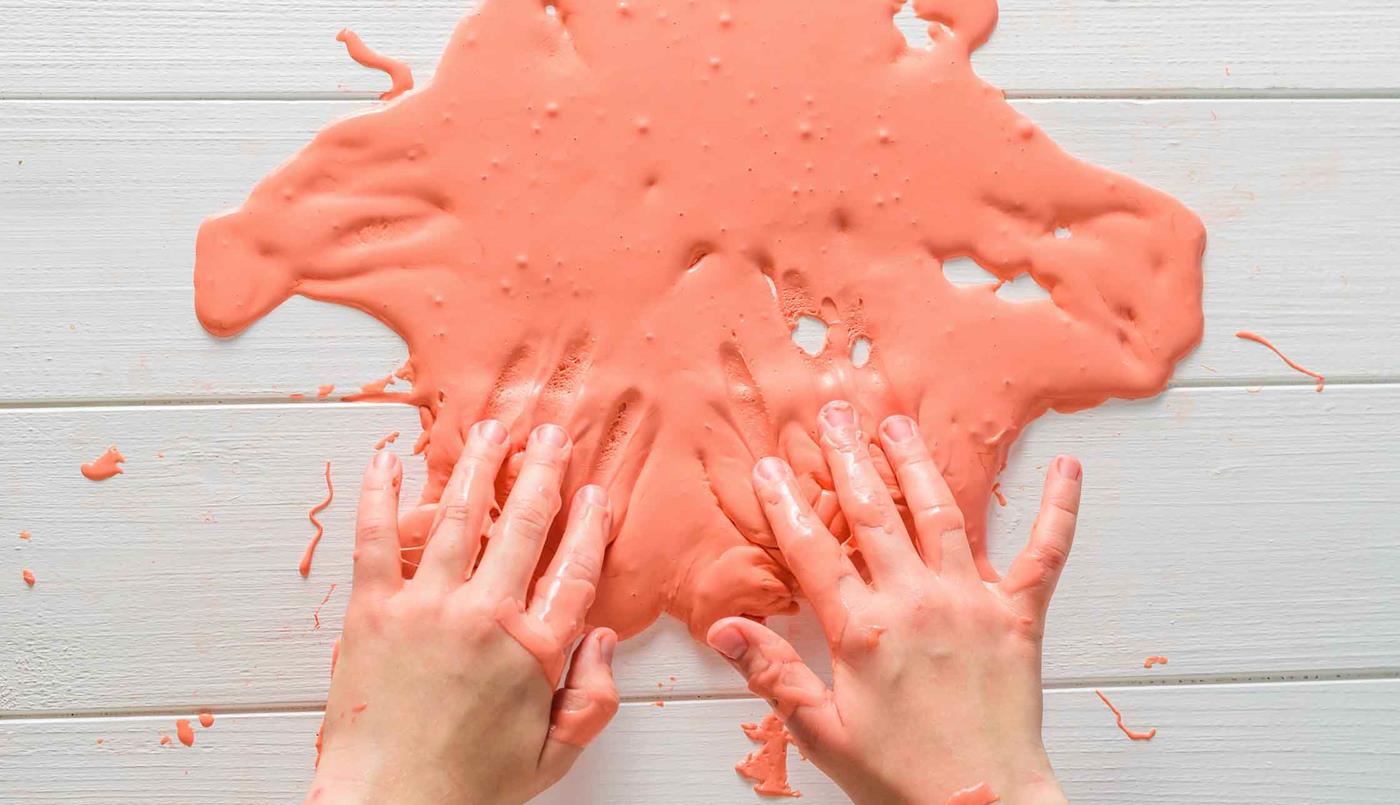 hands playing with oobleck