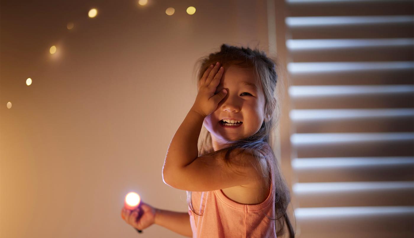 Child playing with torch