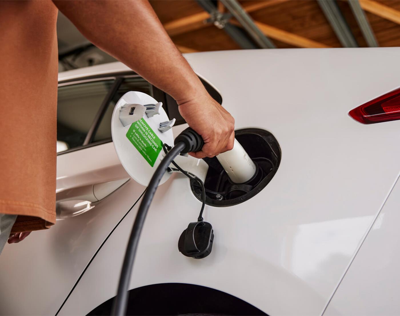 Plugging in electric vehicle