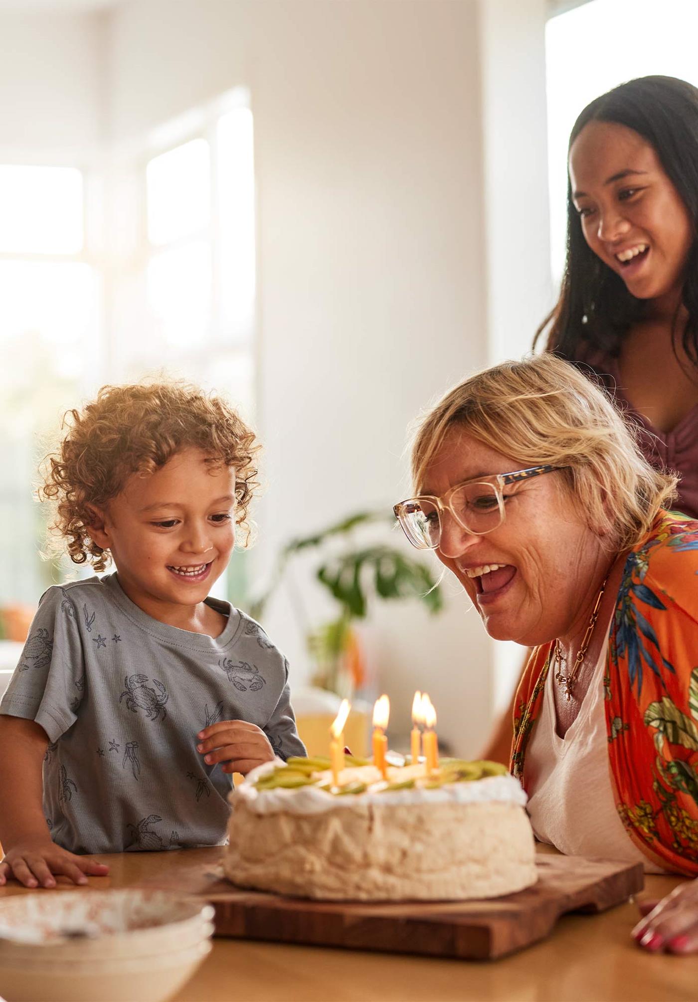Family celebrating with cake 
